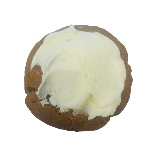 Cookie light brown and orange color with a white cream cheese frosting.