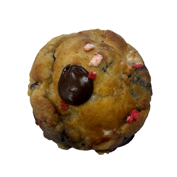 Cookie with a chocolate ball and peppermint pieces on a white background