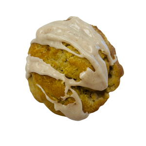 Cookie with white icing on a white background