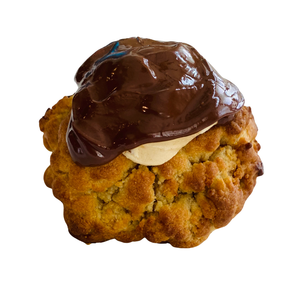 Cookie with chocolate and peanut butter filling on a white background